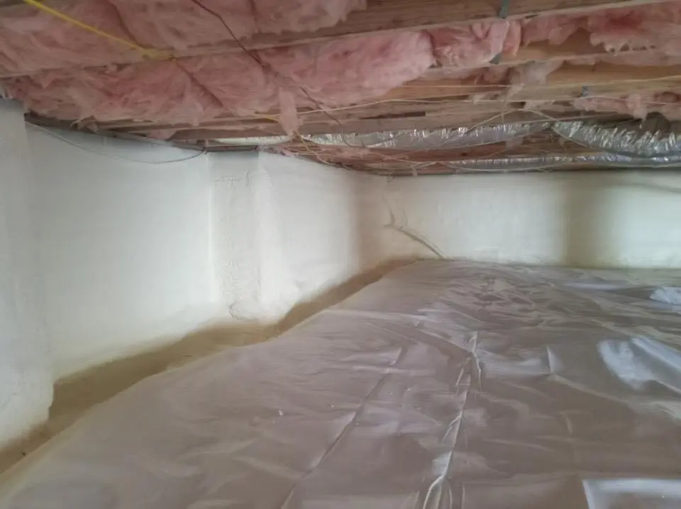 Crawl space encapsulation with closed-cell spray foam for Commercial Roof Restoration in St. Gabriel